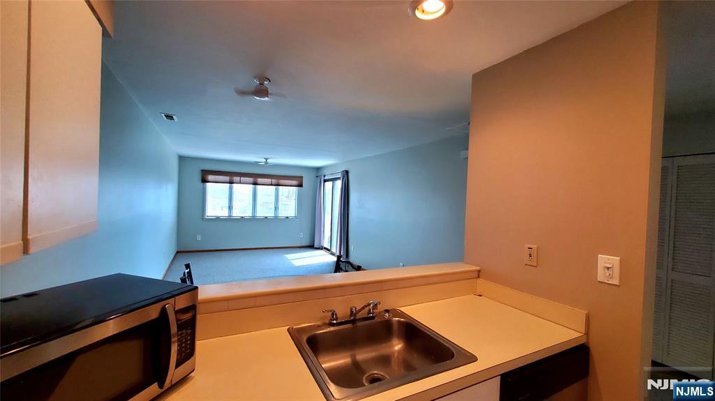 1159 Radio Road, Unit 7 Little Egg Harbor, NJ 08087 - Photo 10 of 38 a room with pool table and a window