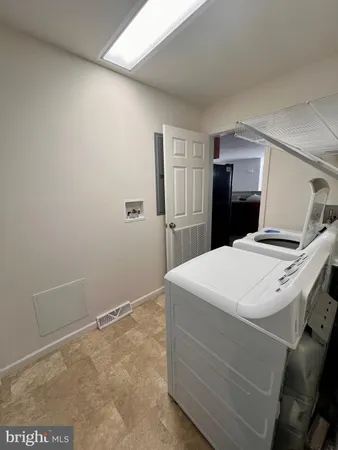 a room with closet and wooden floor