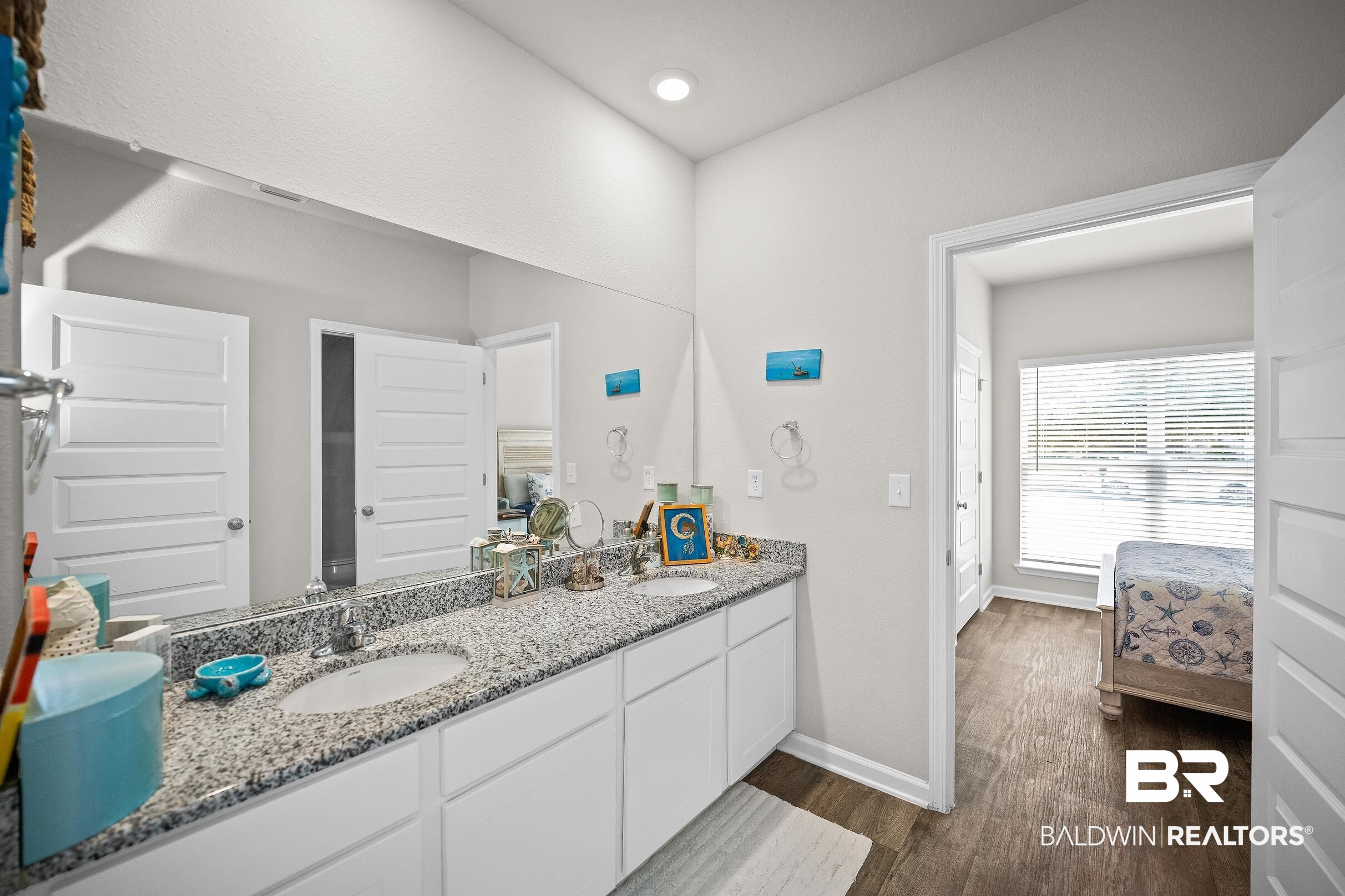 23997 Veranda Circle Elberta, AL 36530 - Photo 12 of 28 Bathroom featuring a double vanity with granite-style countertops and undermount sinks