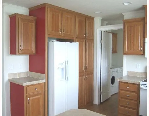 a view of cabinets and window