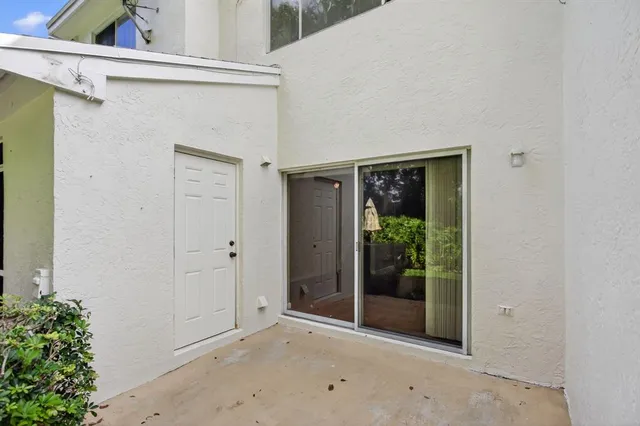 a view of a front door and porch
