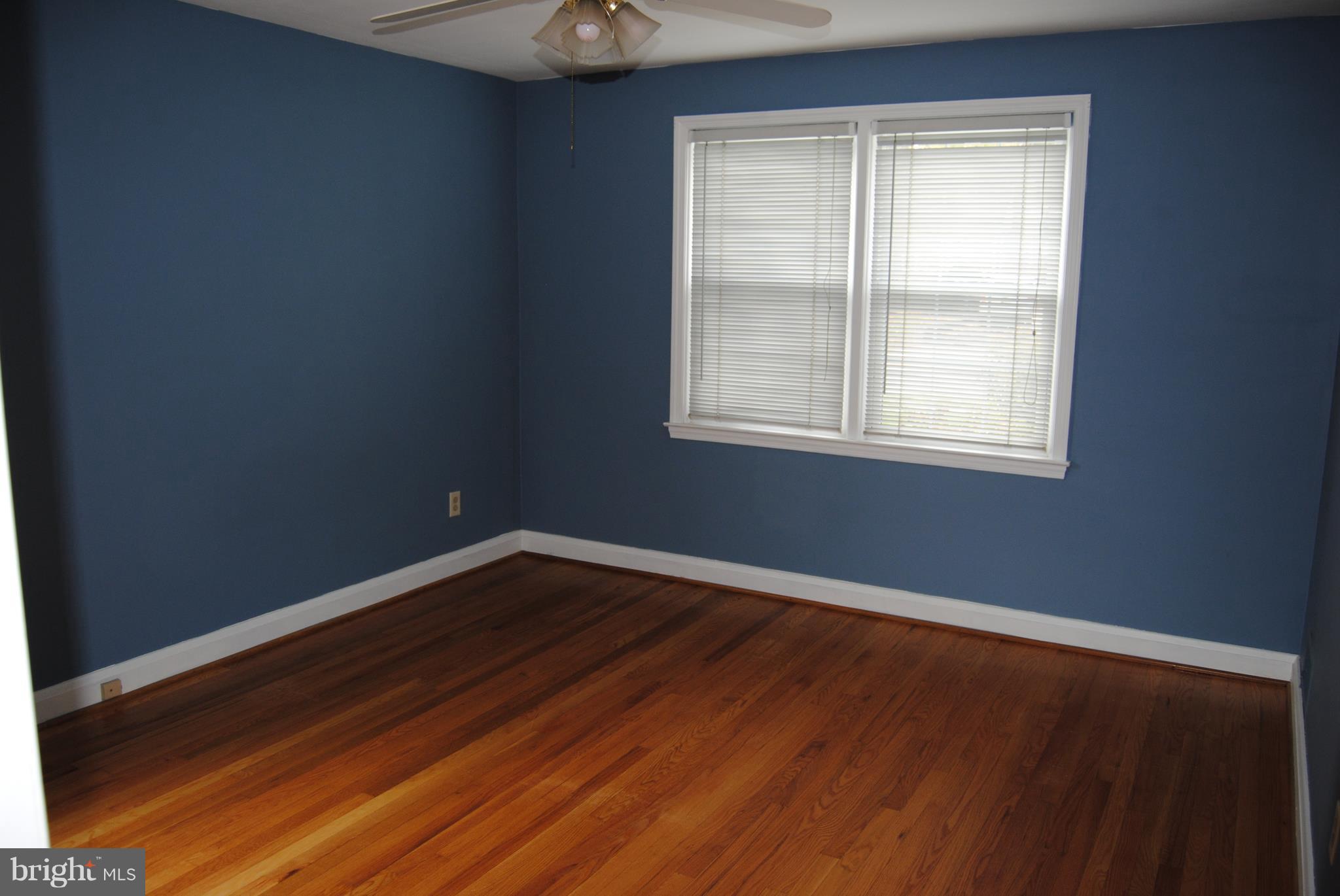 319 Waveland Road Baltimore, MD 21228 - Photo 11 of 21 Bedroom with hardwoods