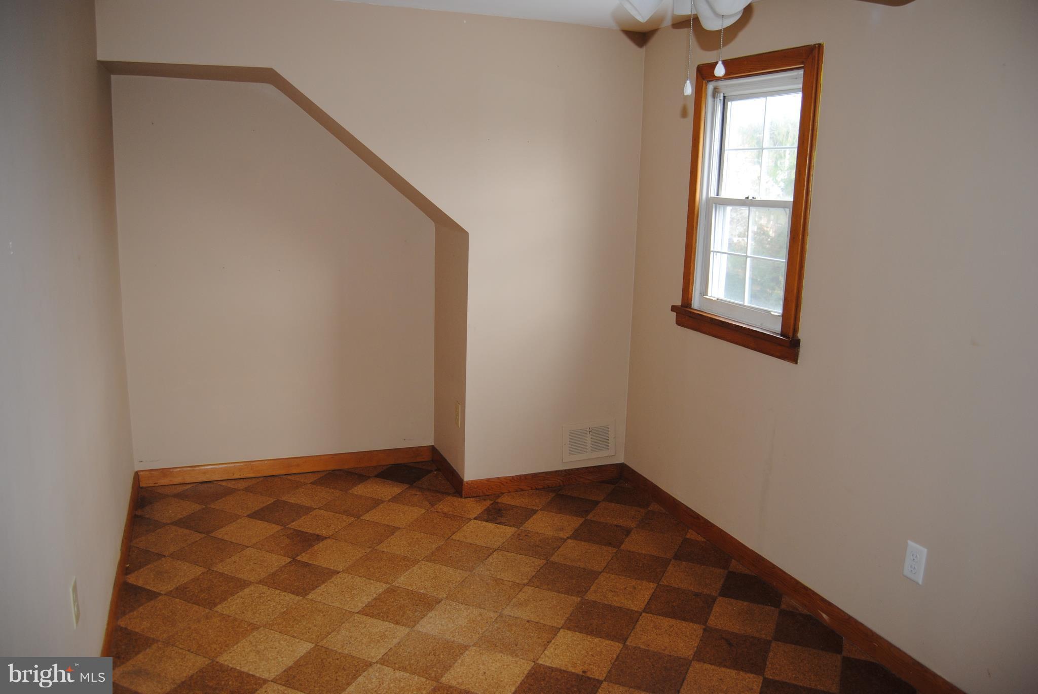 319 Waveland Road Baltimore, MD 21228 - Photo 15 of 21 4th Bedroom w/ cork floor