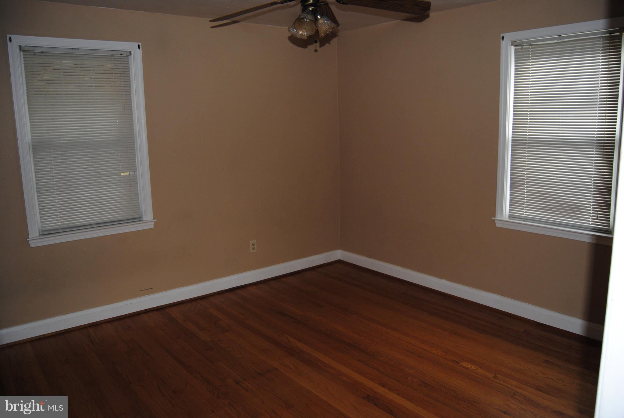 319 Waveland Road Baltimore, MD 21228 - Photo 10 of 21 Bedroom with hardwoods