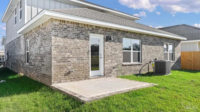 a front view of a house with yard
