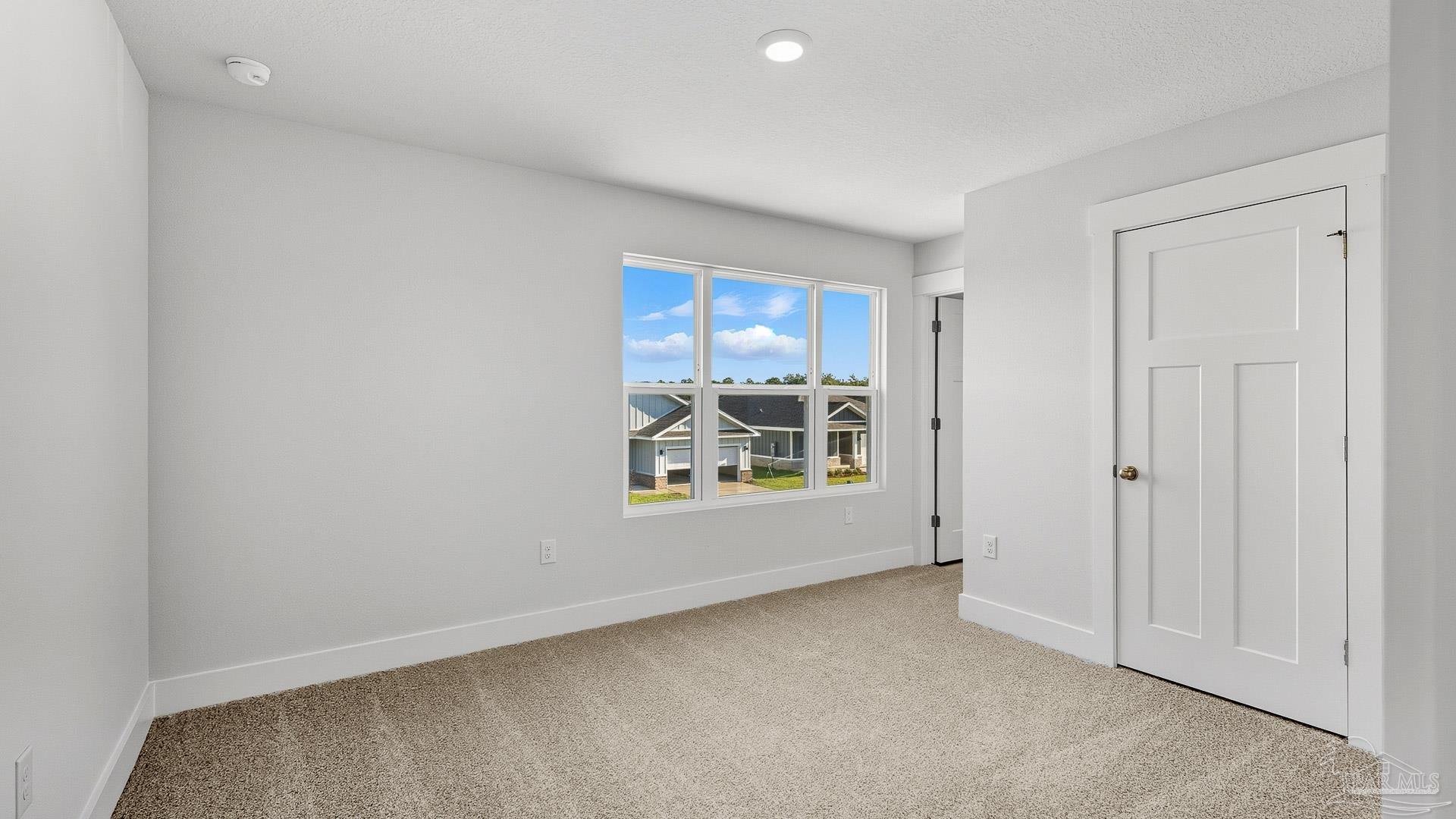 136 Albatross Street Cantonment, FL 32533 - Photo 33 of 43 an empty room with a window