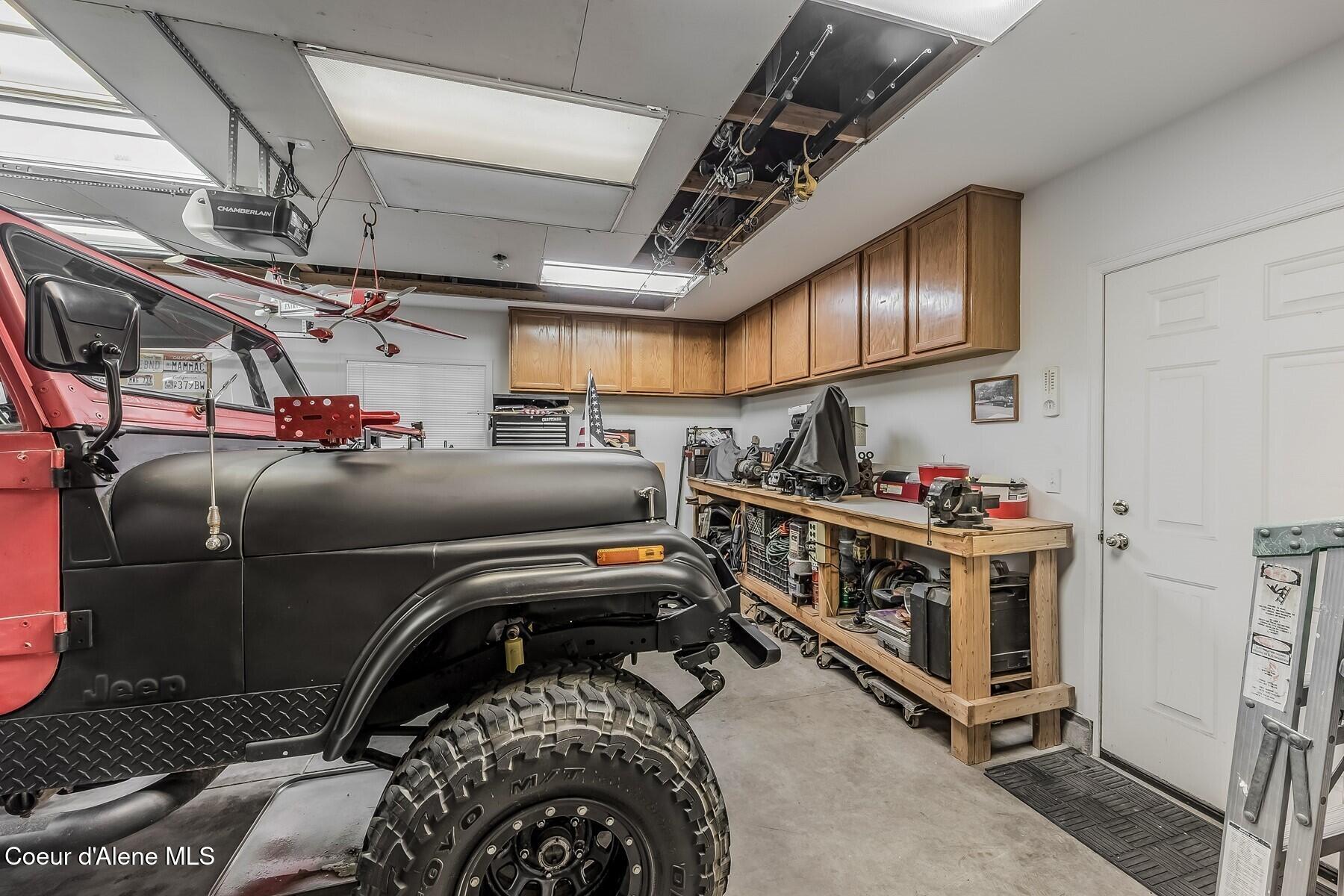 8862 North Mac Arthur Way Hayden, ID 83835 - Photo 23 of 47 Workbench in Garage