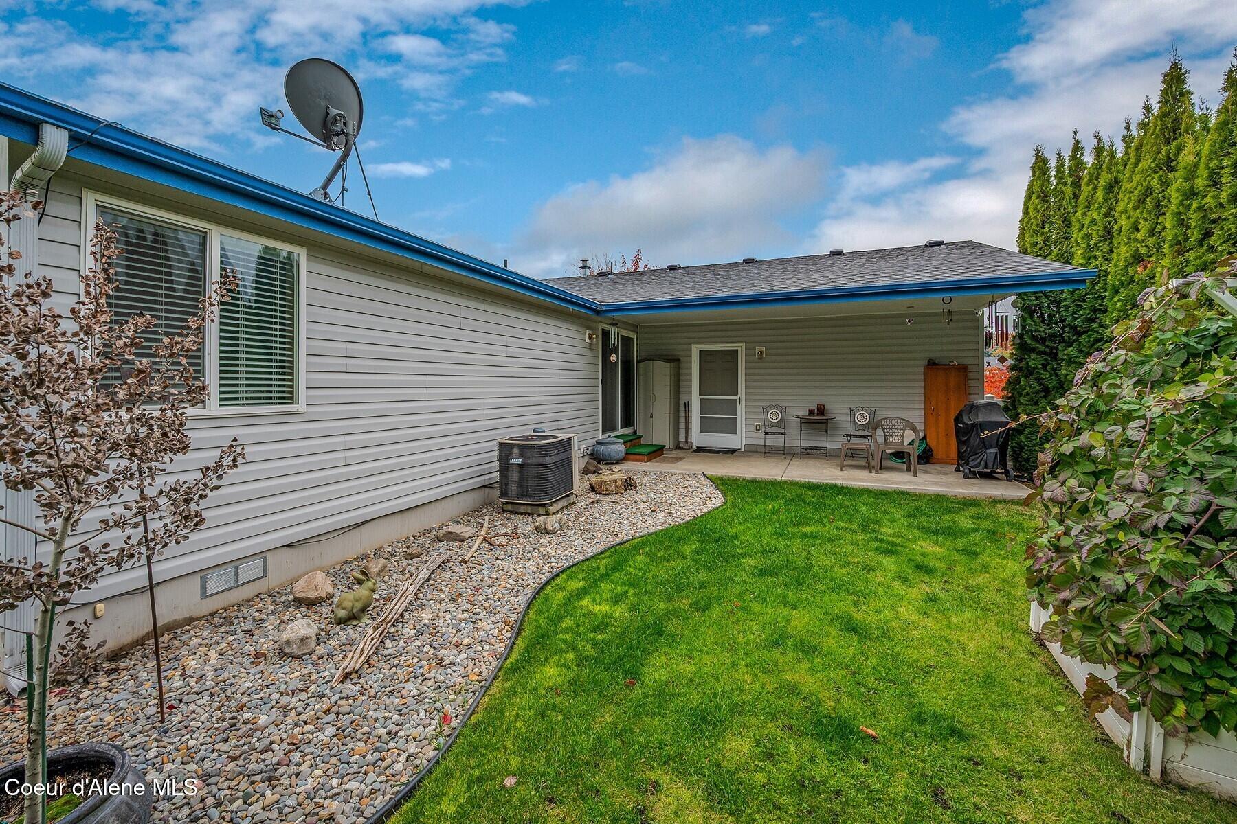 8862 North Mac Arthur Way Hayden, ID 83835 - Photo 25 of 47 Back Patio Overlooking Yard