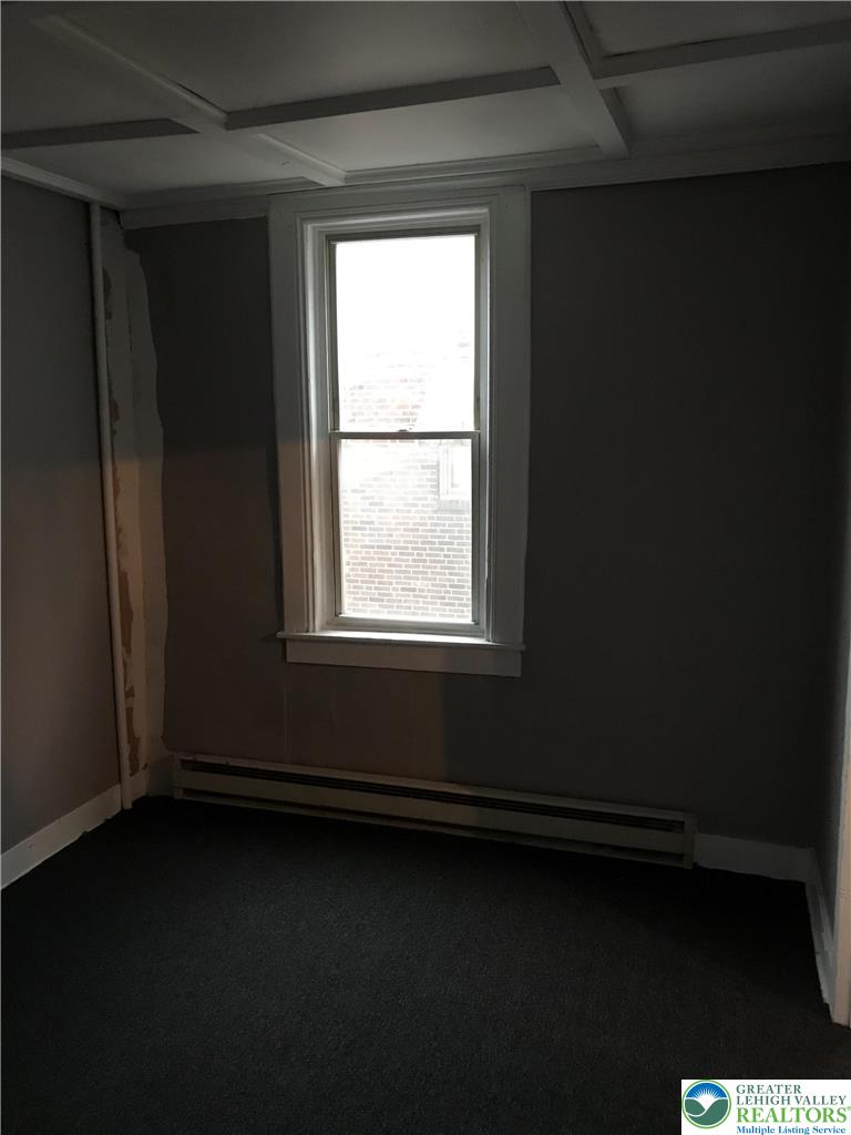 44 Mauch Chunk Street, Unit 7 Tamaqua, PA 18252 - Photo 7 of 8 a view of an empty room with a window