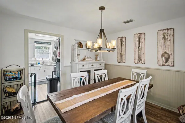 a view of a dining room with furniture