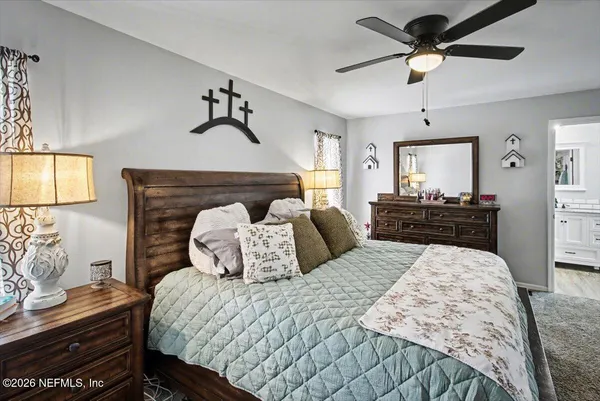 a bathroom with 2 sink and a mirror