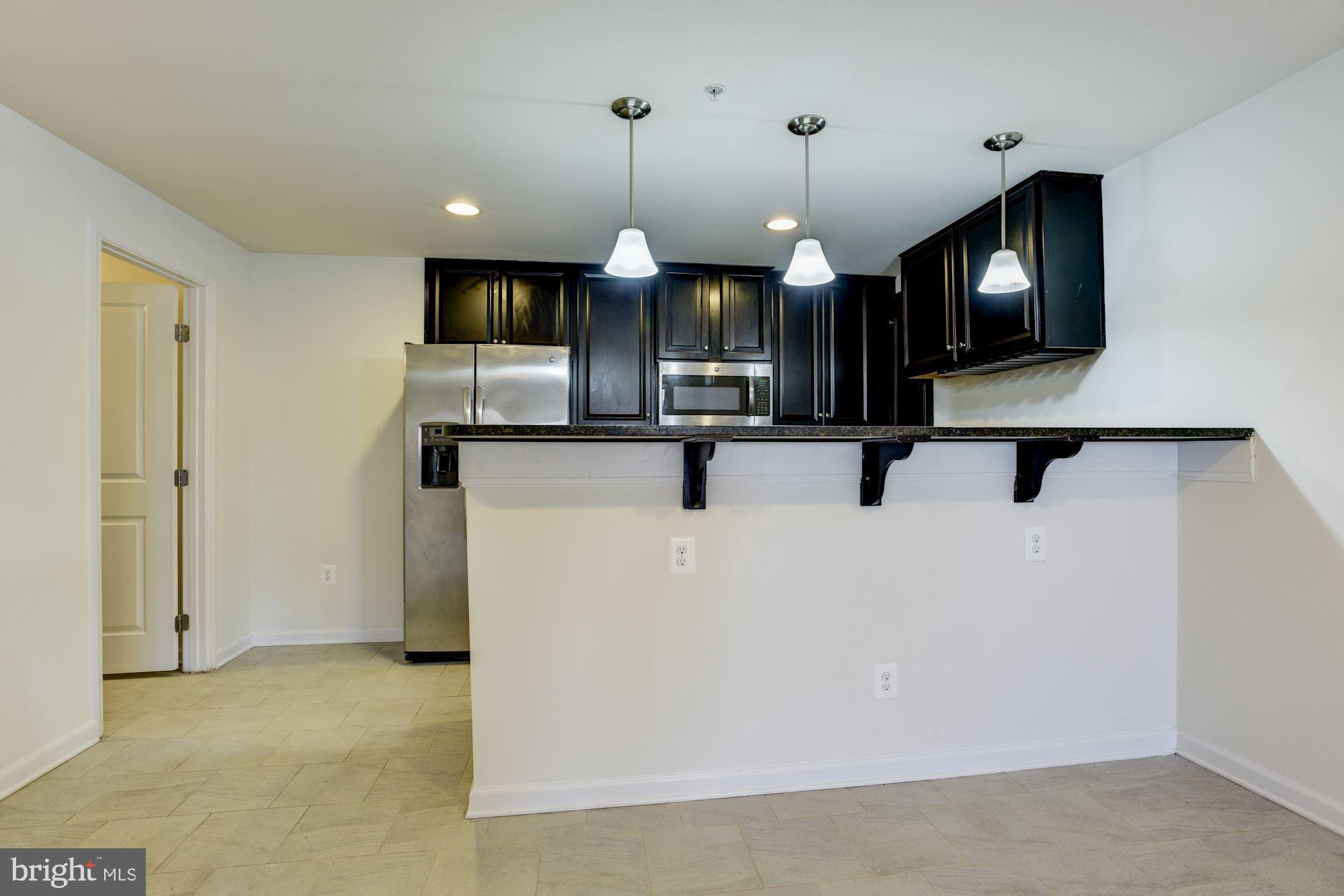 10446 Windlass Run Road Baltimore, MD 21220 - Photo 37 of 48 Lower Level Kitchen