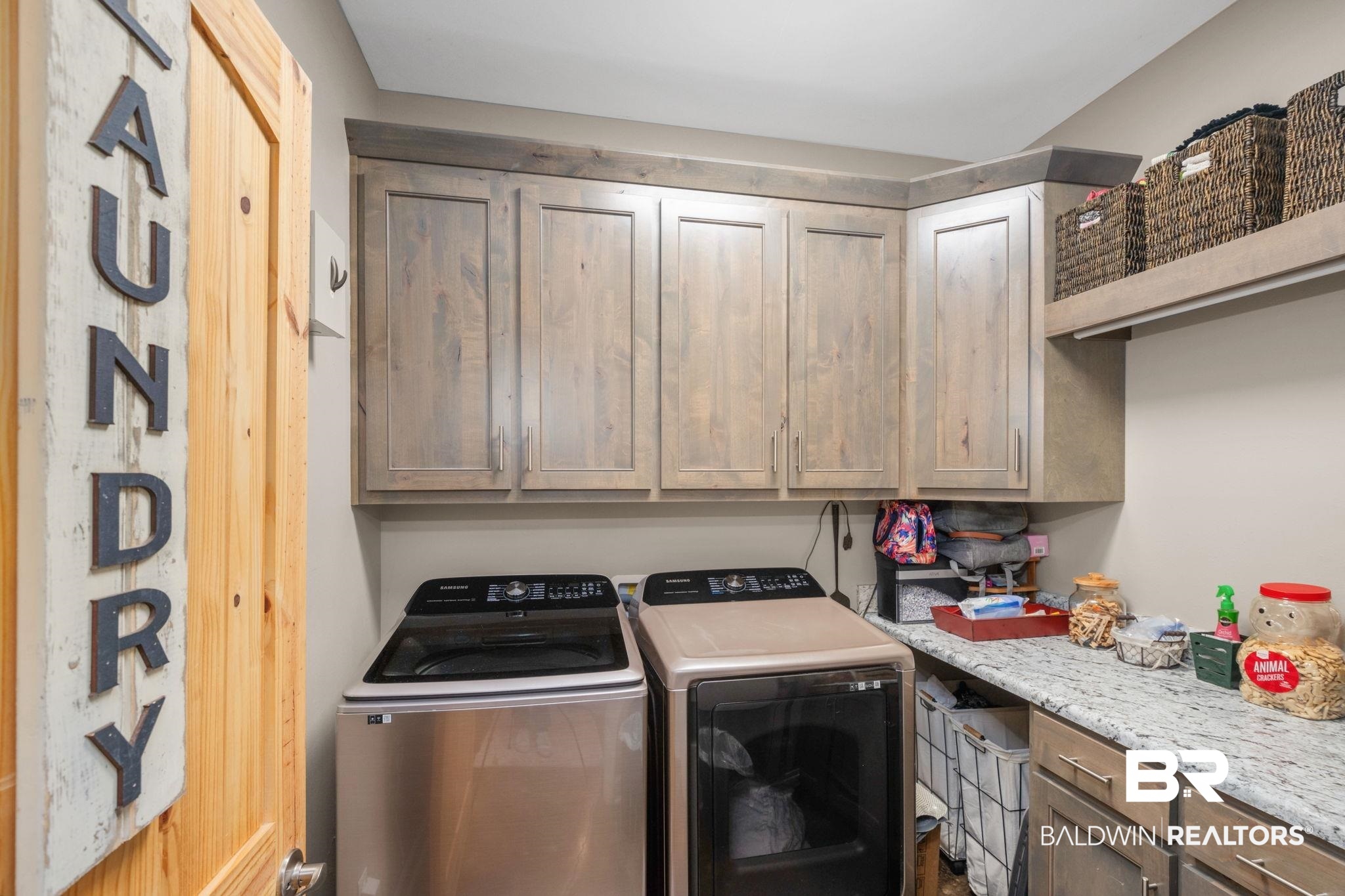4331 Hamilton Oaks Lane Mobile, AL 36695 - Photo 23 of 38 Clothes washing area with separate washer and dryer and cabinet space