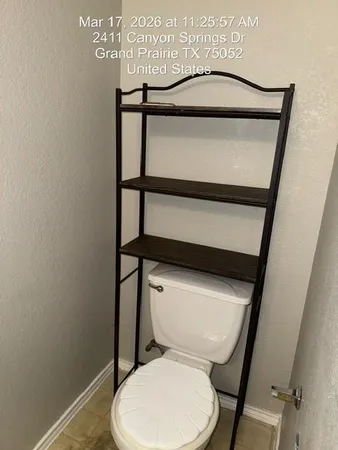 a view of staircase with white walls