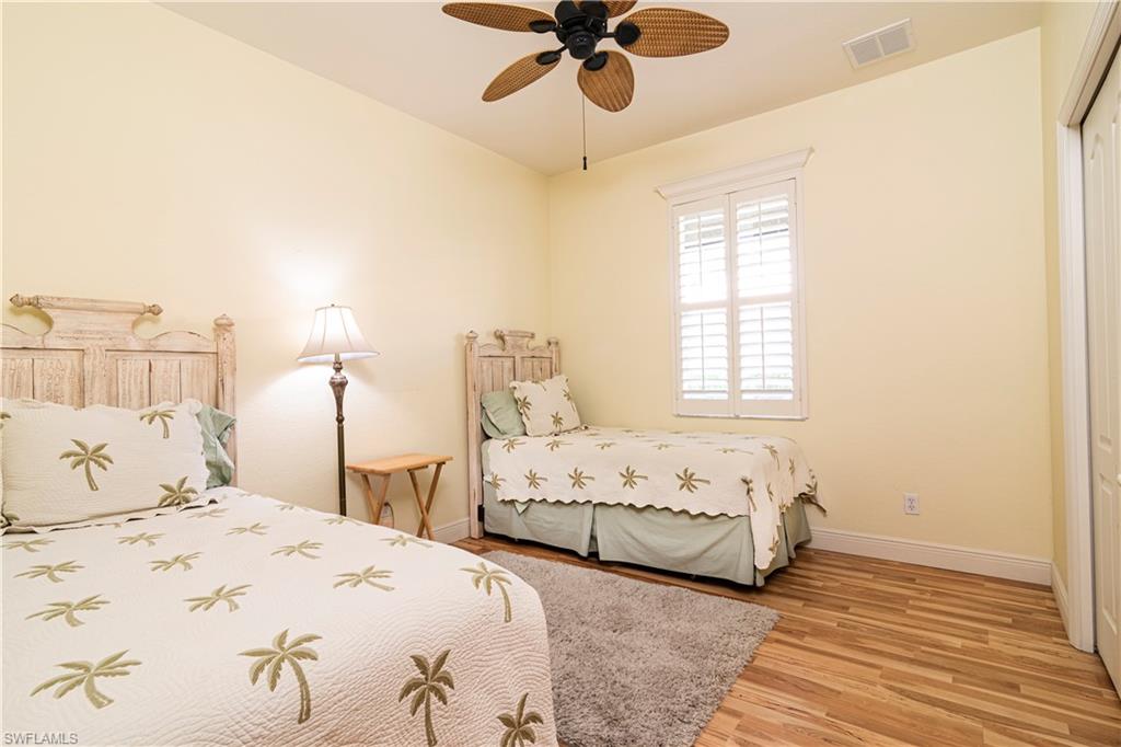 20058 Serre Drive Estero, FL 33928 - Photo 15 of 22 a bedroom with double bed and a window