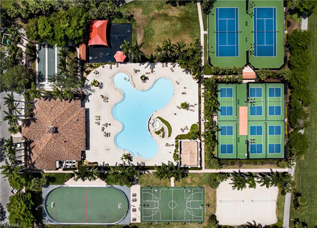 20058 Serre Drive Estero, FL 33928 - Photo 21 of 22 front view of house with a yard and potted plants