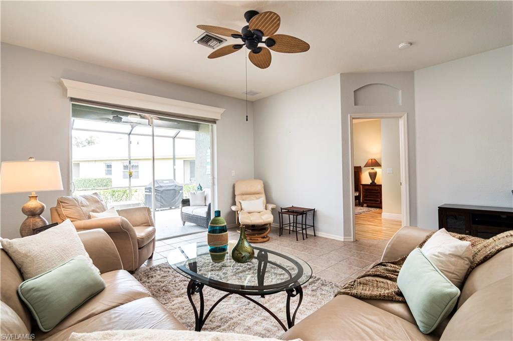 20058 Serre Drive Estero, FL 33928 - Photo 5 of 22 a living room with furniture and a large window