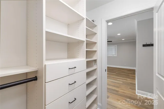 a view of an empty walk in closet