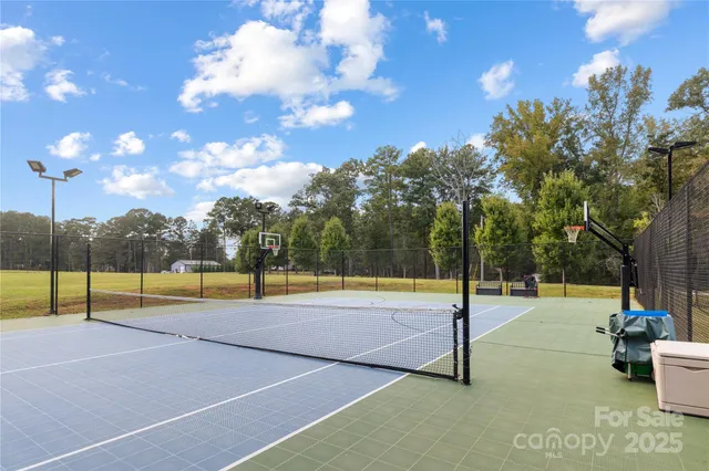 a view of a swimming pool with an outdoor seating