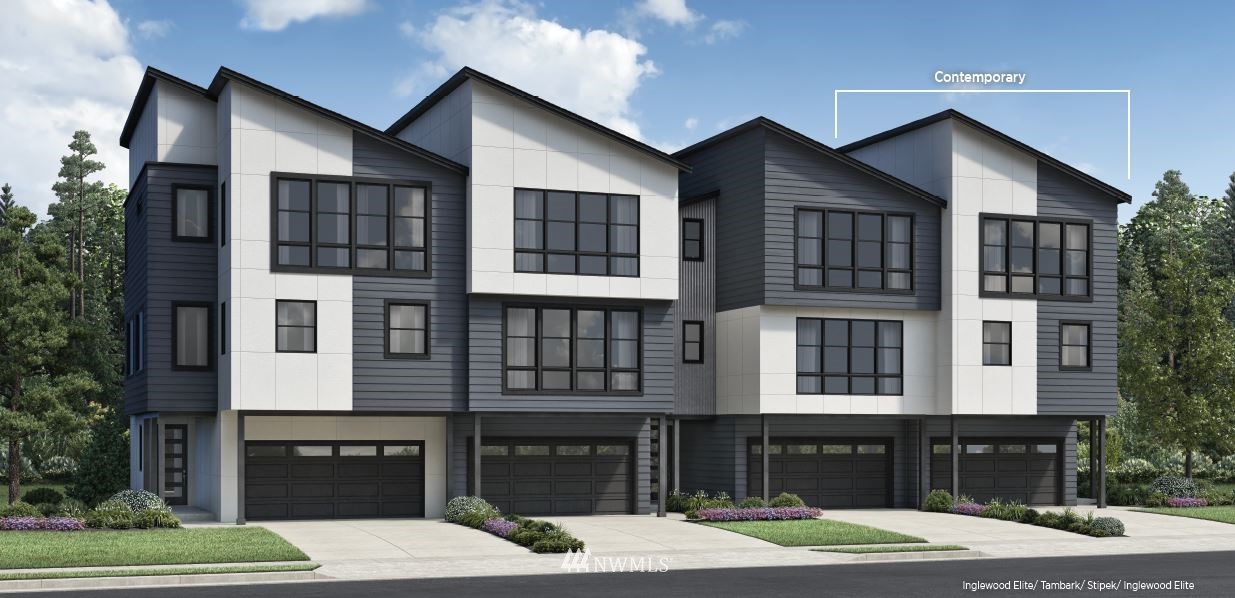 21921 25th Avenue Southeast, Unit D Bothell, WA 98021 - Photo 1 of 2 a front view of a house with a yard and balcony