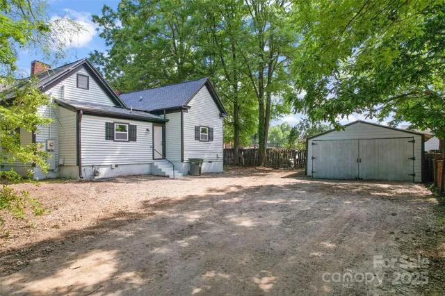 a house with a tree in front of it
