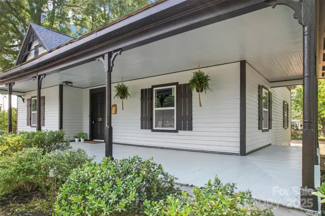 a view of a house with a potted plant