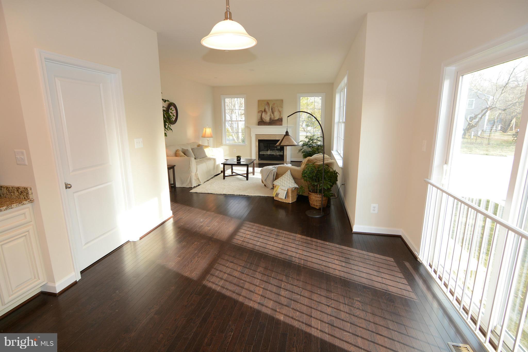 1217 Shesley Road Mayo, MD 21037 - Photo 12 of 30 a living room with furniture and a large window