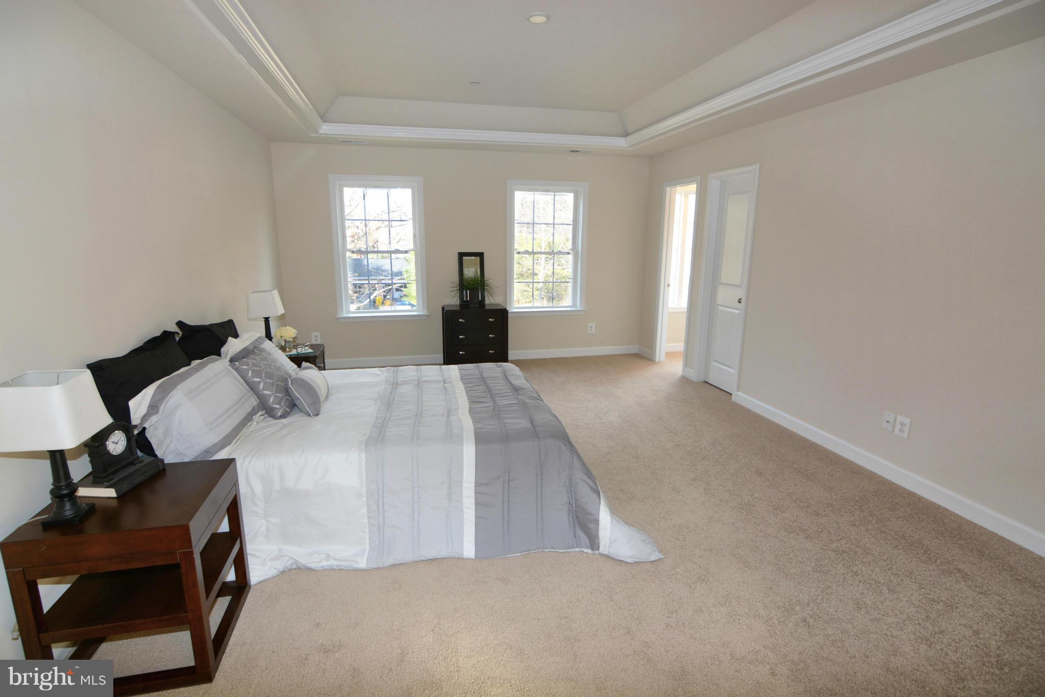 1217 Shesley Road Mayo, MD 21037 - Photo 17 of 30 a bed room with a bed window and chair