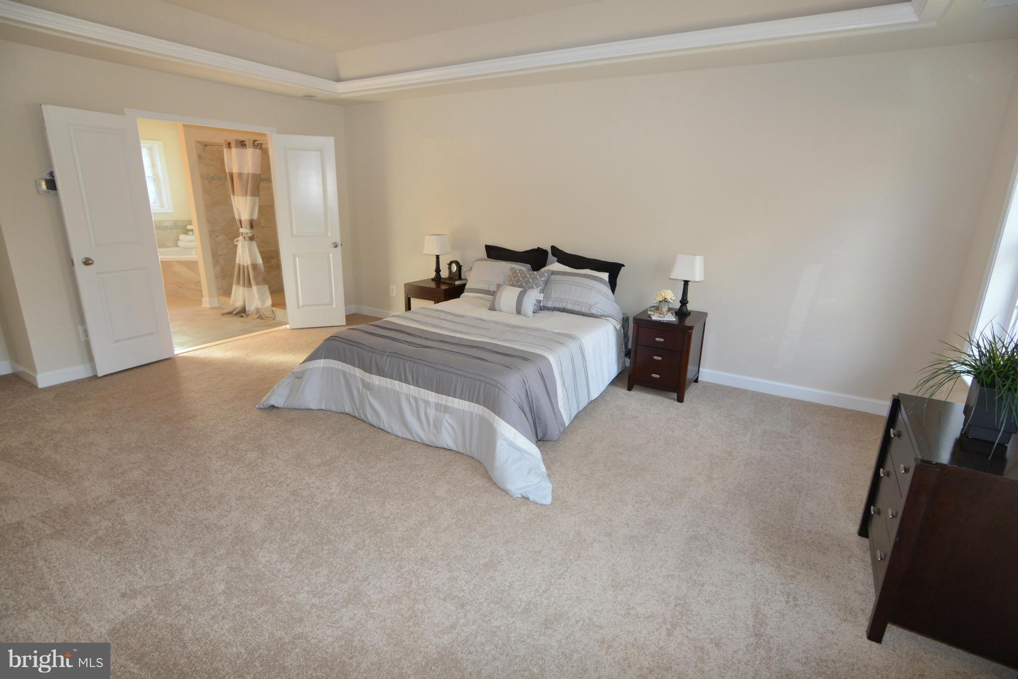 1217 Shesley Road Mayo, MD 21037 - Photo 19 of 30 a bedroom with a bed and a window