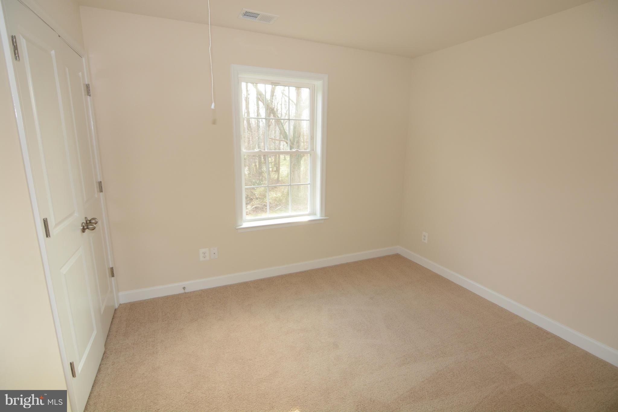 1217 Shesley Road Mayo, MD 21037 - Photo 22 of 30 an empty room with a window