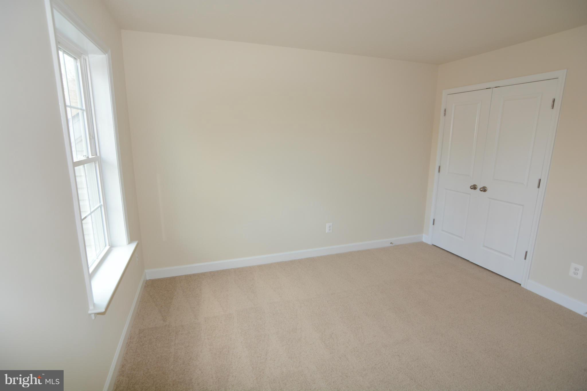 1217 Shesley Road Mayo, MD 21037 - Photo 24 of 30 an empty room with a window