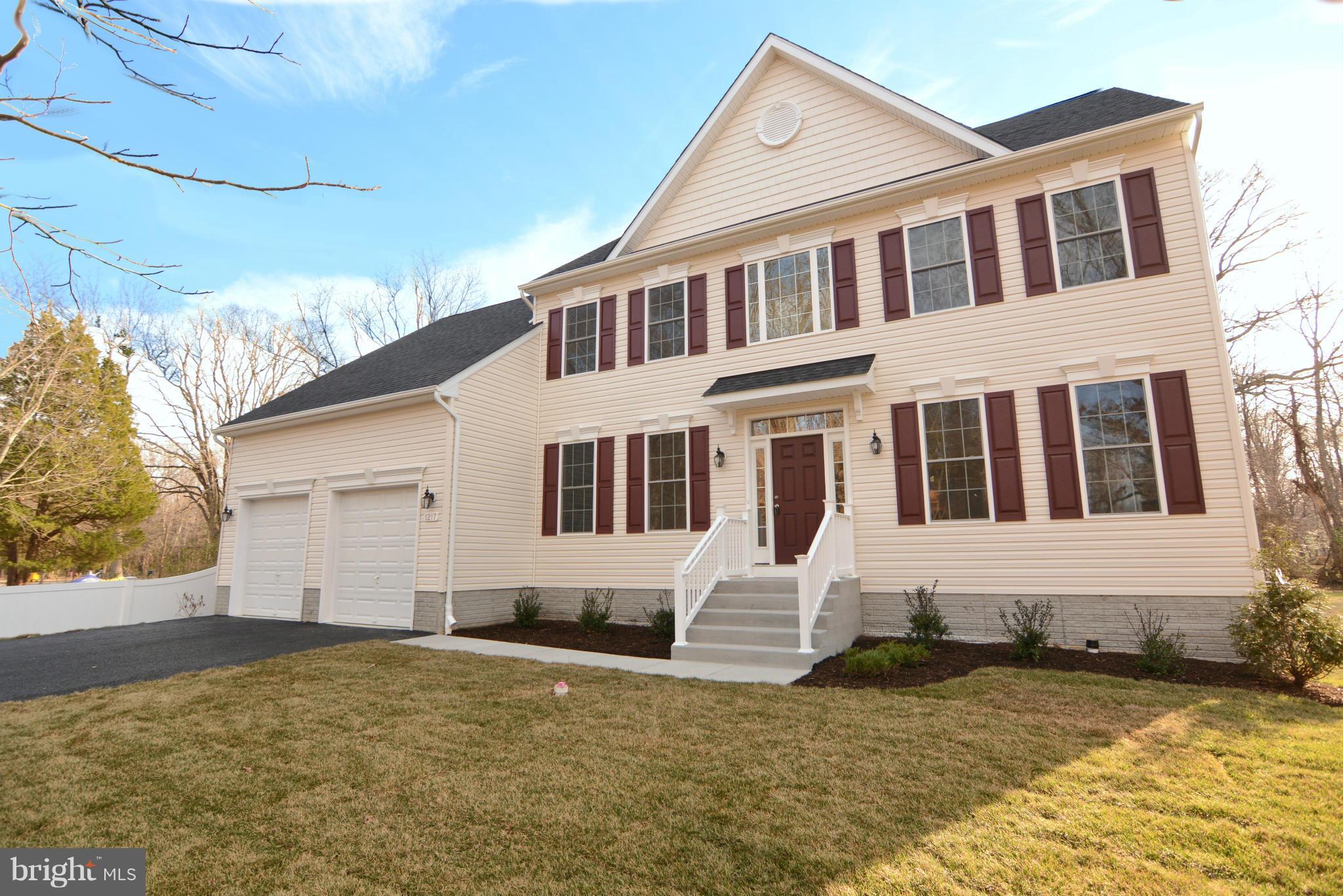 1217 Shesley Road Mayo, MD 21037 - Photo 29 of 30 a front view of a house with a yard