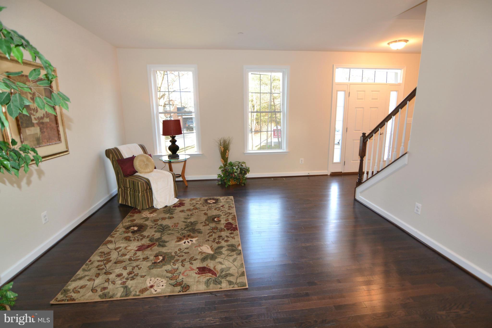 1217 Shesley Road Mayo, MD 21037 - Photo 3 of 30 a living room with furniture and a wooden floor