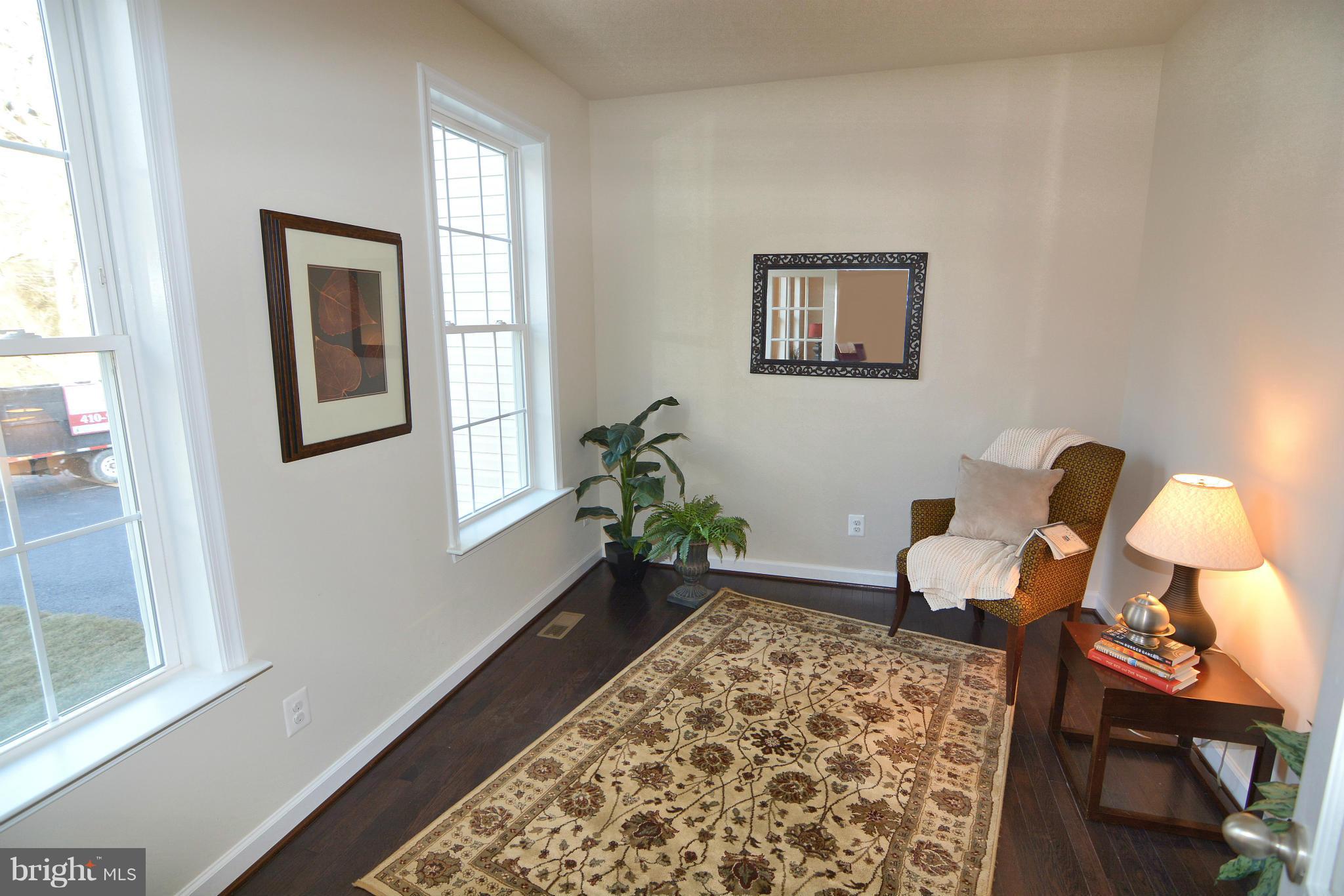 1217 Shesley Road Mayo, MD 21037 - Photo 7 of 30 a bed room with a bed and a window