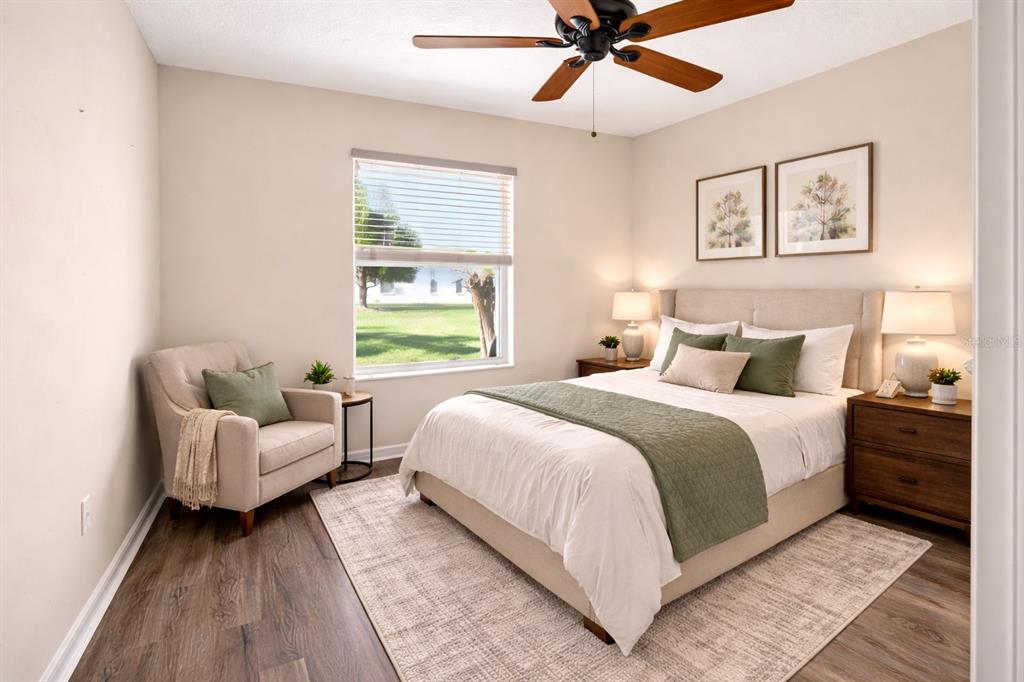 1706 Southwest 156th Lane Ocala, FL 34473 - Photo 22 of 44 a bedroom with a bed and a couch