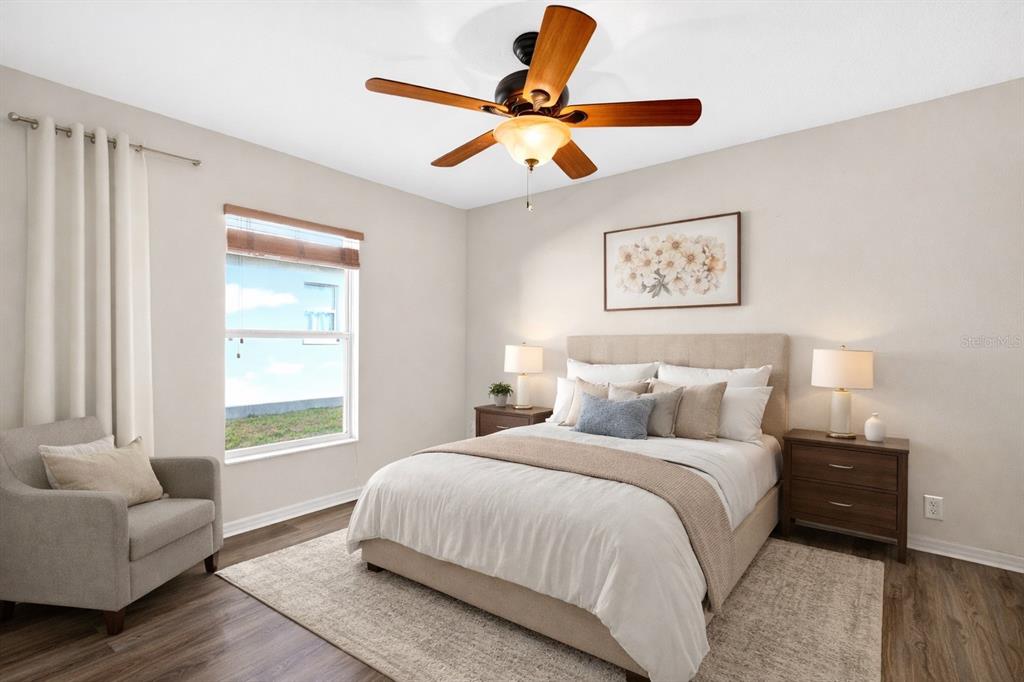 1706 Southwest 156th Lane Ocala, FL 34473 - Photo 27 of 44 a bedroom with a bed and a couch