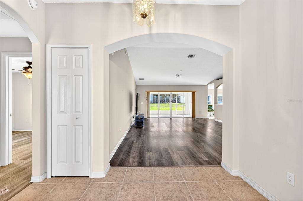 1706 Southwest 156th Lane Ocala, FL 34473 - Photo 3 of 44 wooden floor in an empty room with a window