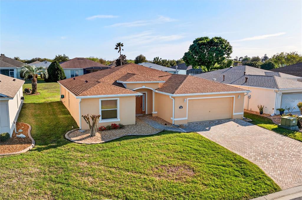 1706 Southwest 156th Lane Ocala, FL 34473 - Photo 32 of 44 a aerial view of a house with a yard