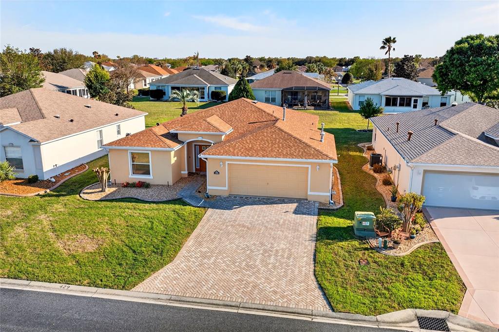 1706 Southwest 156th Lane Ocala, FL 34473 - Photo 33 of 44 an aerial view of residential houses with outdoor space