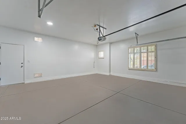 a utility room with sink dryer and washer