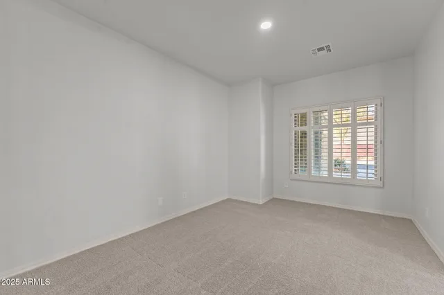 a workspace with furniture and window