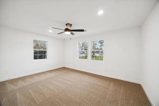 a bathroom with a shower and a sink