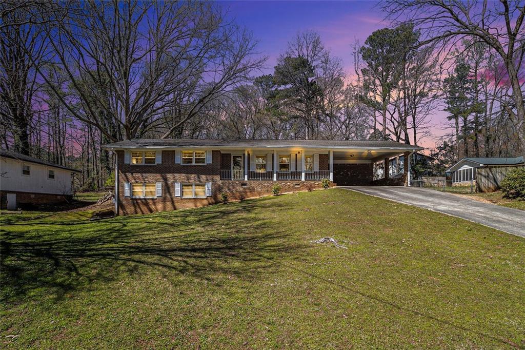 441 Navarre Drive Stone Mountain, GA 30087 - Photo 1 of 1 a view of a house with a swimming pool