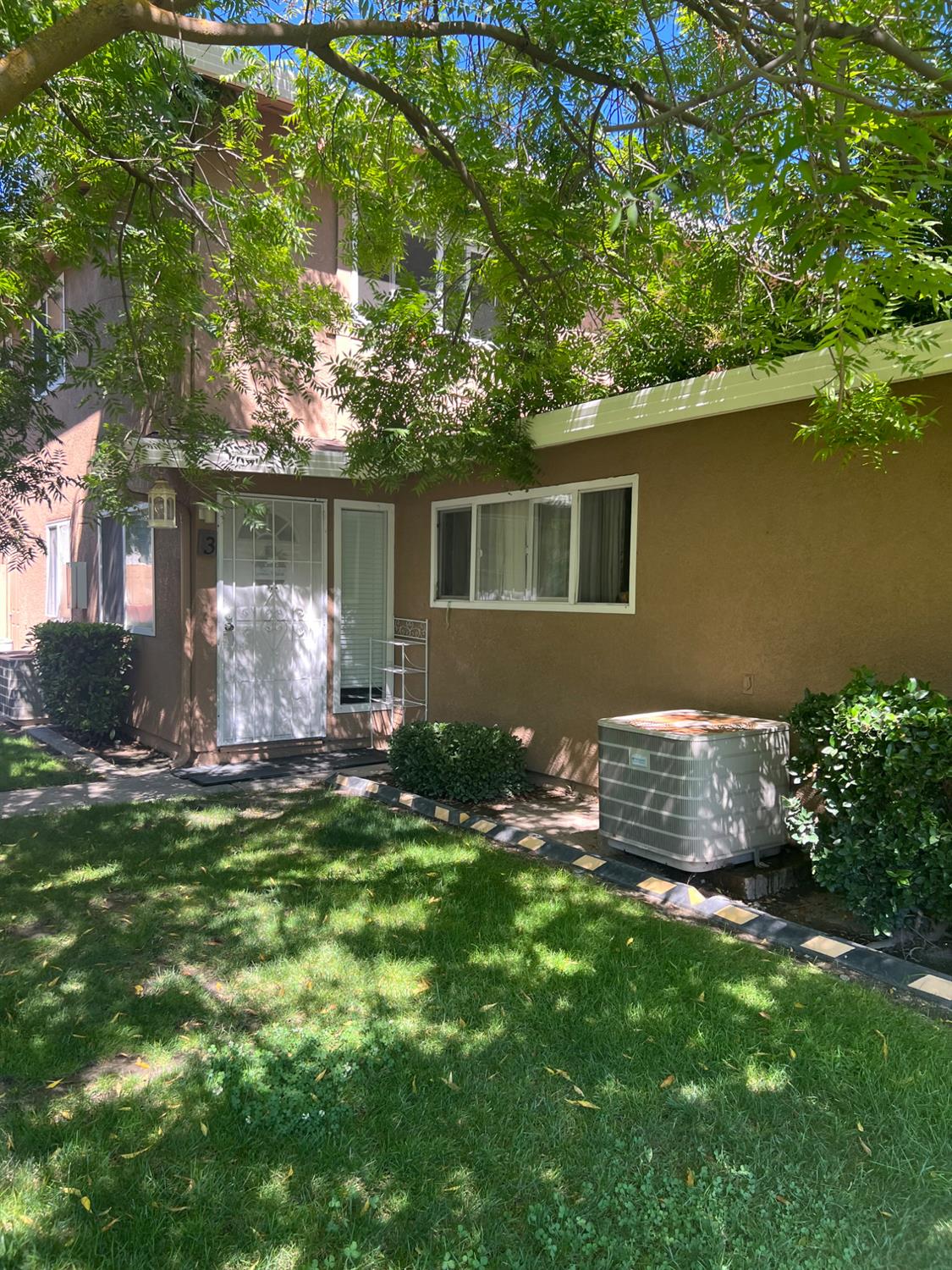 front view of house with a yard