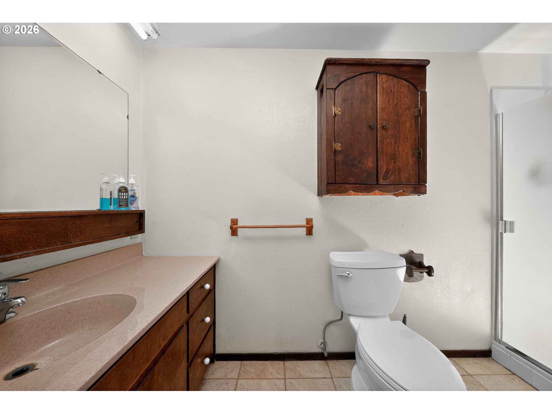 840 South 1st Street Cottage Grove, OR 97424 - Photo 21 of 39 a bathroom with a toilet sink and mirror