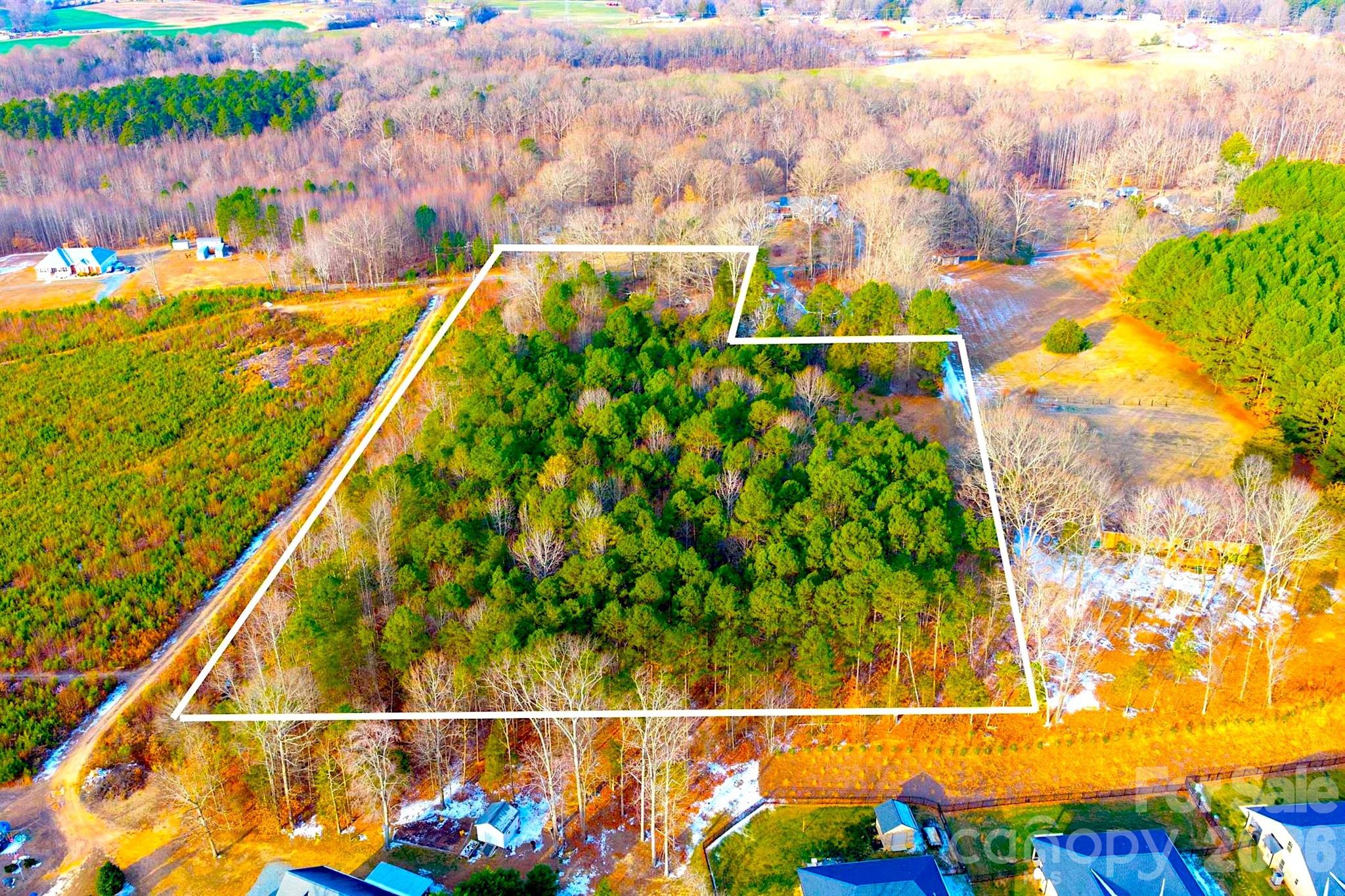 Tbd Simpson Road Locust, NC 28097 - Photo 5 of 10 a view of swimming pool with a garden
