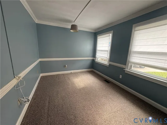 a kitchen with stainless steel appliances granite countertop a refrigerator and a stove