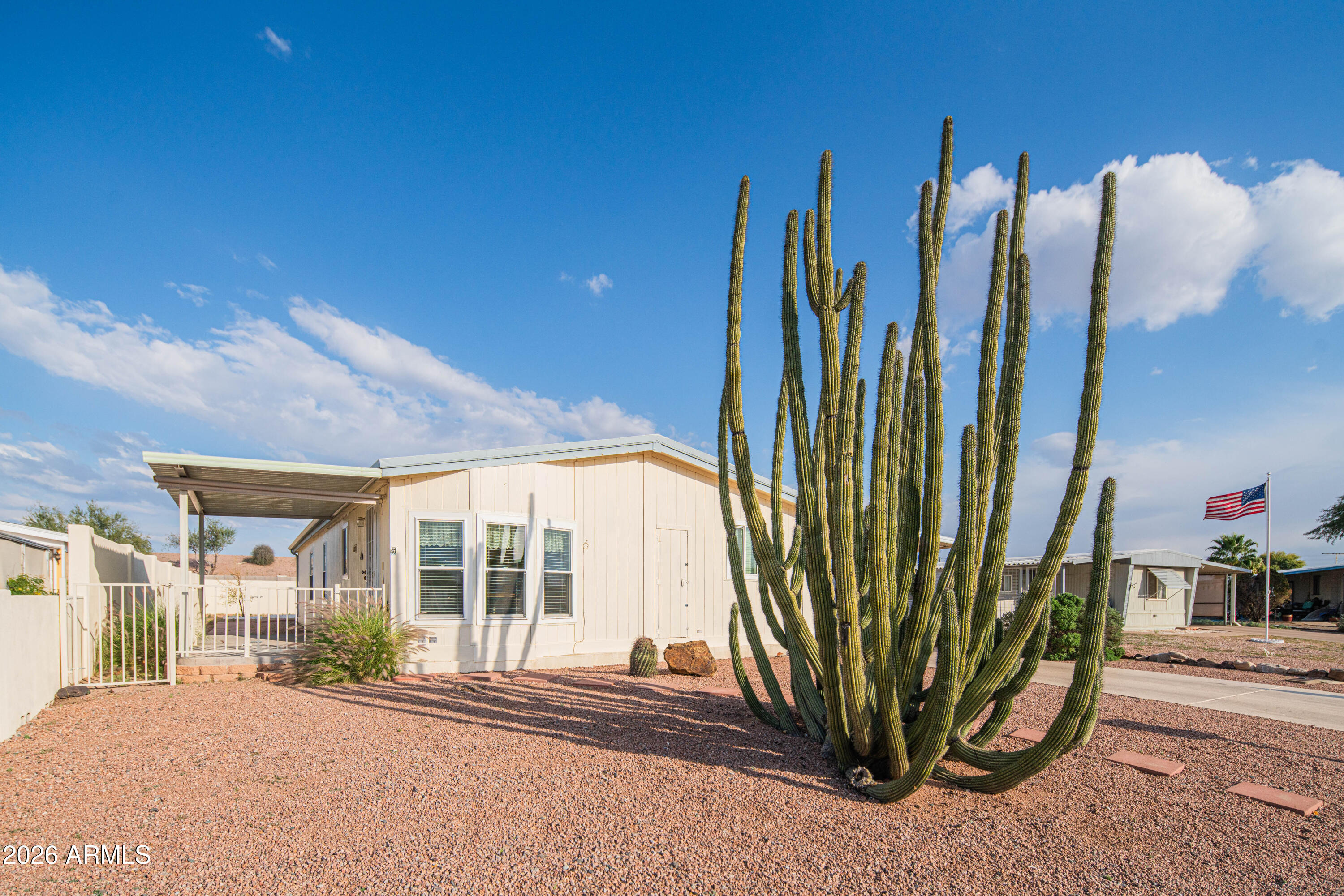 633 South 87th Place Mesa, AZ 85208 - Photo 13 of 55 a view of a house with a backyard and a yard