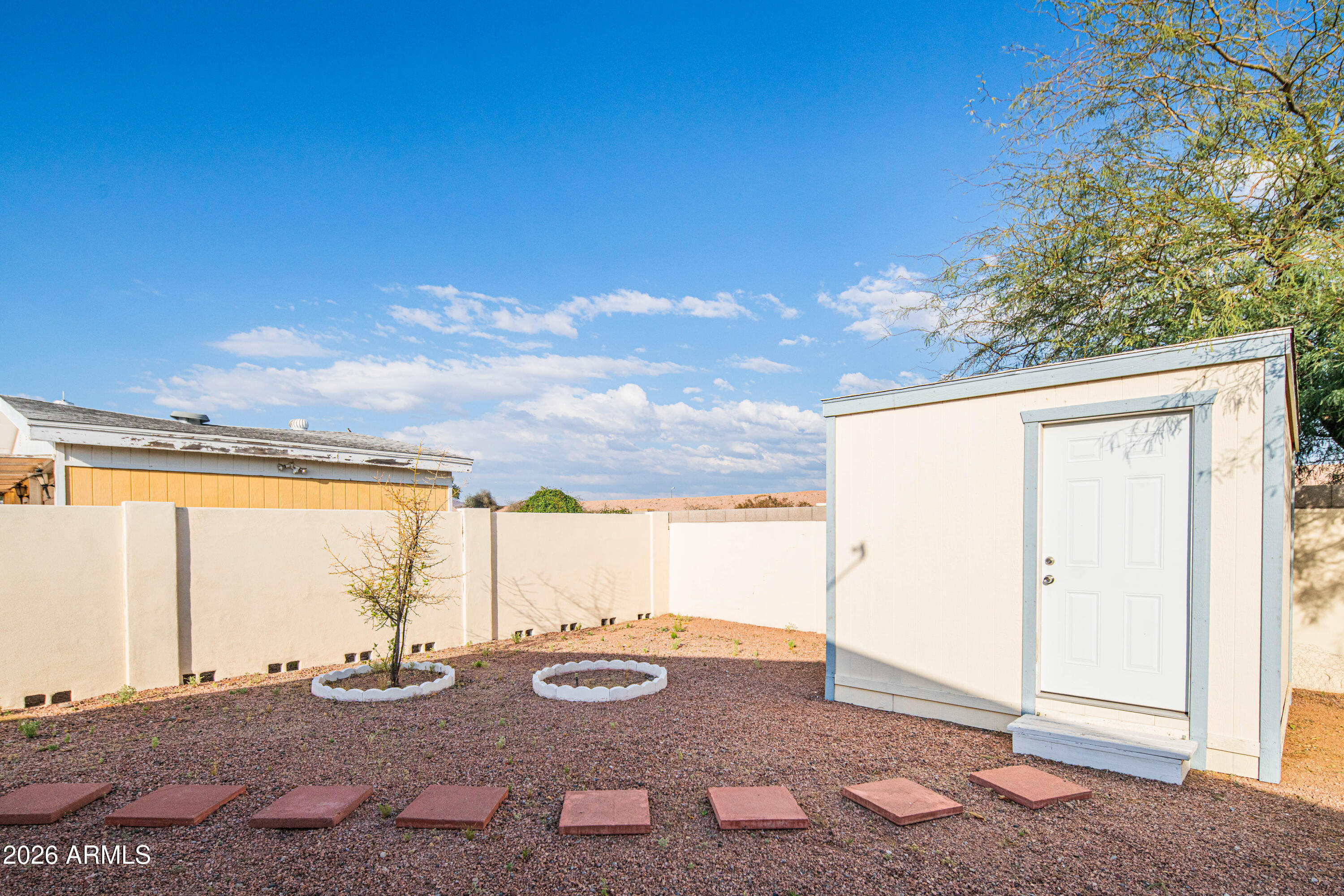 633 South 87th Place Mesa, AZ 85208 - Photo 22 of 55 a view of a backyard of the house