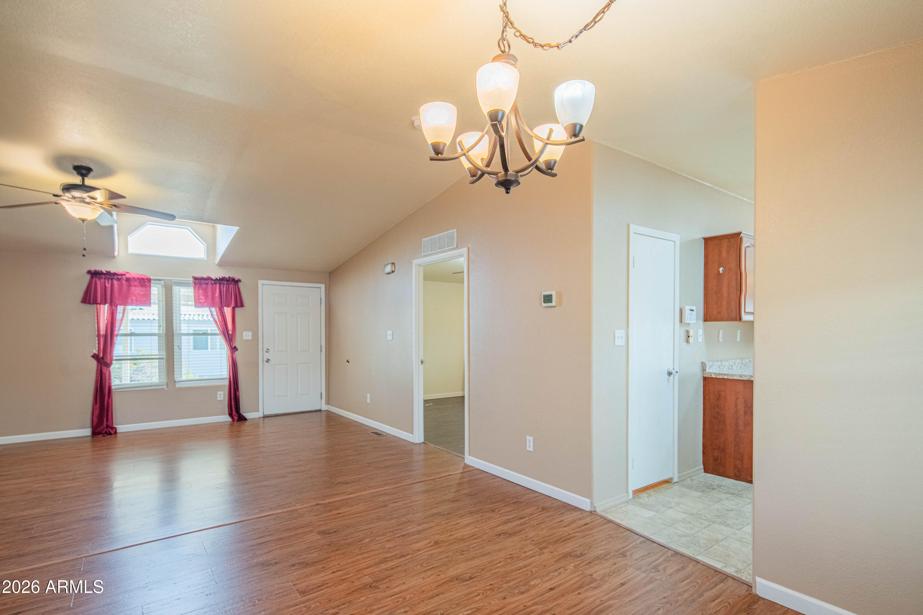 633 South 87th Place Mesa, AZ 85208 - Photo 36 of 55 a view of a room with wooden floor